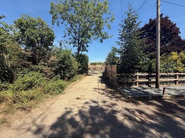 POTENTIAL DEVELOPMENT: A 2 ACRE PARCEL OF FREEHOLD LAND WITH ROAD ACCESS 1037 SQUARE FOOT BRICK BUILT BARN PLUS STRUCTURE FOR ADDITIONAL BUILDING