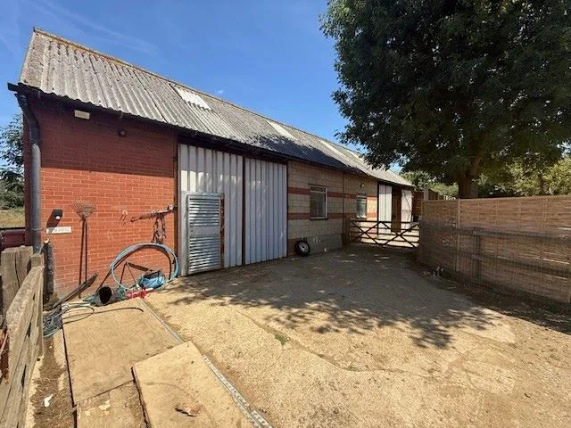 POTENTIAL DEVELOPMENT: A 2 ACRE PARCEL OF FREEHOLD LAND WITH ROAD ACCESS 1037 SQUARE FOOT BRICK BUILT BARN PLUS STRUCTURE FOR ADDITIONAL BUILDING
