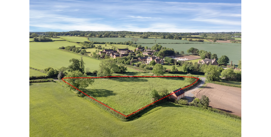 Approximately 1.42 acres of grazing land 