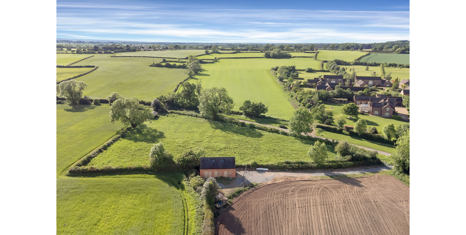 Approximately 1.42 acres of grazing land 