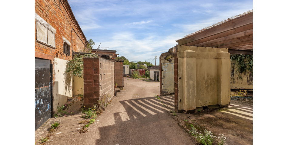 An extensive site to include farmhouse, outbuildings and gardens.
