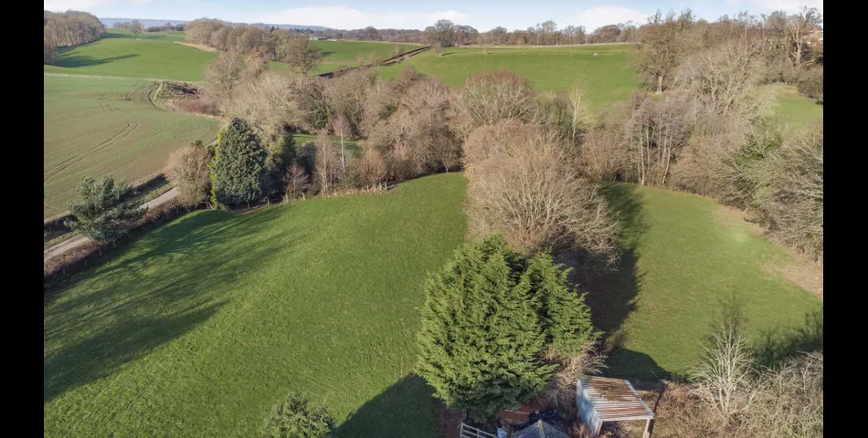 A charming detached cottage with fantastic development opportunity. 