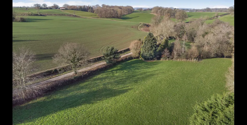 A charming detached cottage with fantastic development opportunity. 