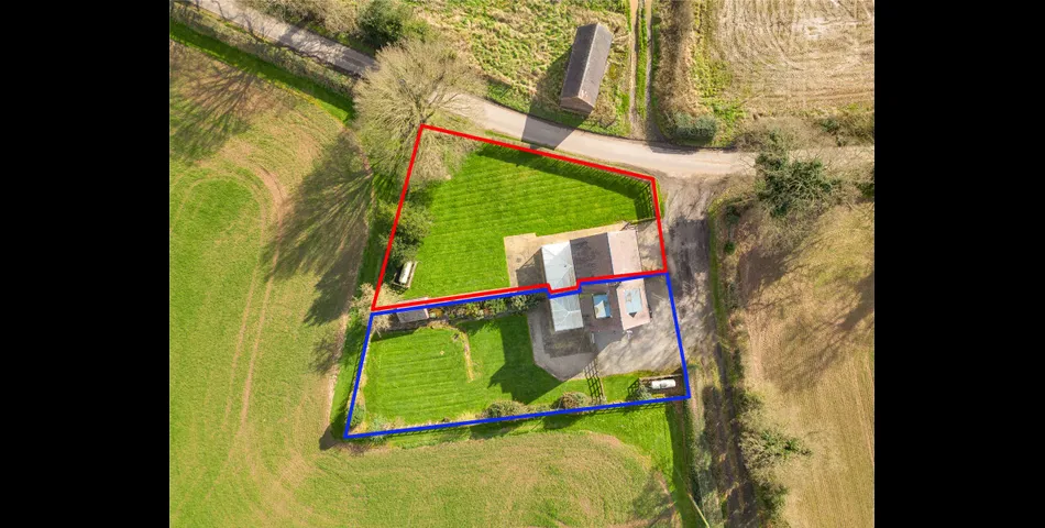 A two-bedroom semi-detached red brick cottage with generous gardens and parking