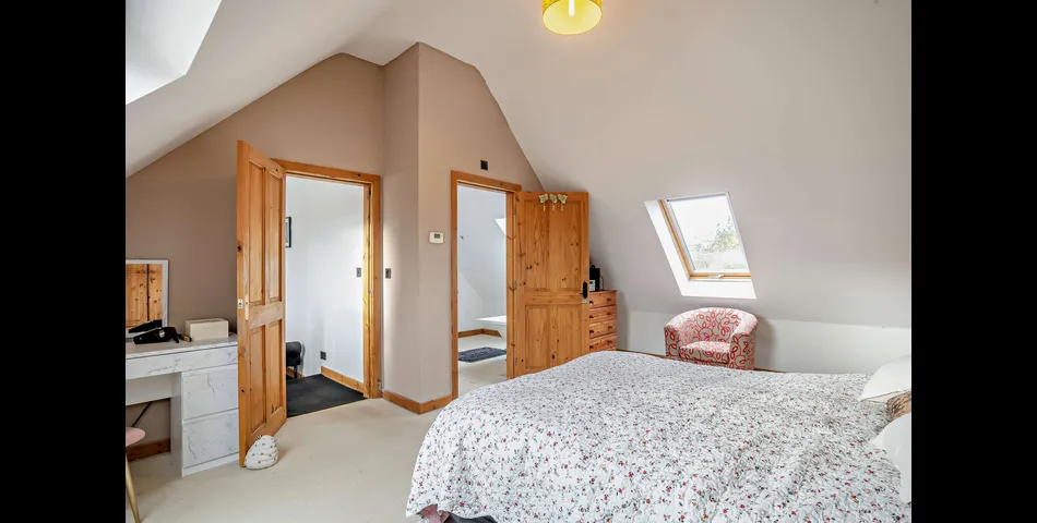 A generous family residence in c.3.68 acres of land within a village setting.