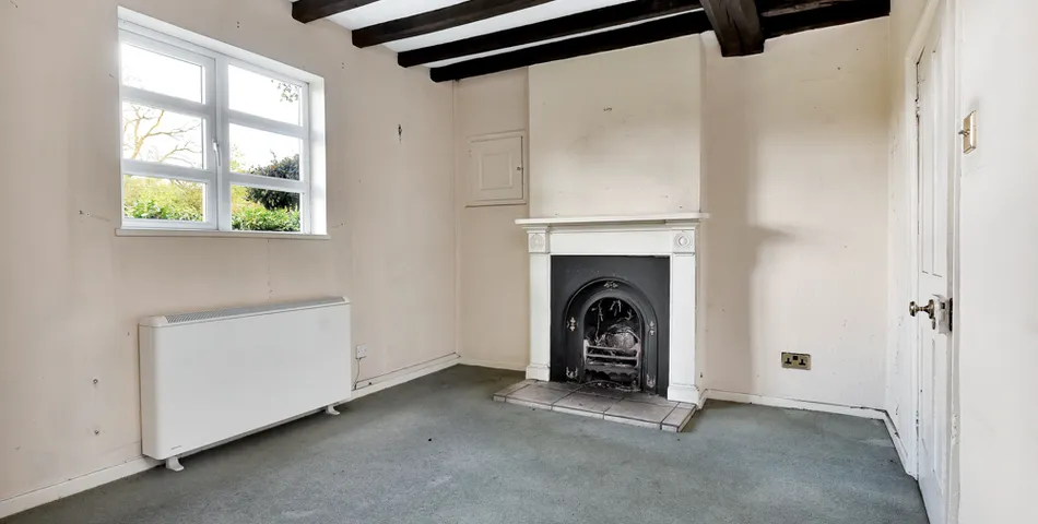A smallholding with a cottage in need of total refurbishment, outbuildings and about 7.35 acres of land