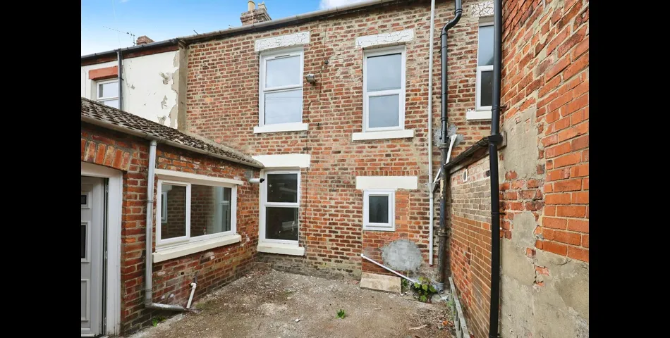 FOUR BEDROOM TERRACED PROPERTY