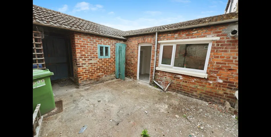 FOUR BEDROOM TERRACED PROPERTY