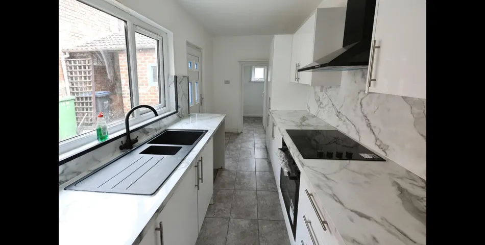 FOUR BEDROOM TERRACED PROPERTY
