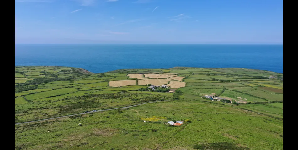 Almost 61 Acres of Land with Buildings