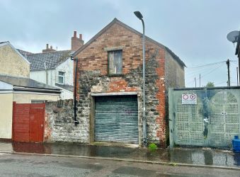 Freehold detached, two storey coach house in a popular location in Barry with development potential for variety of uses subject to necessary planning consents.