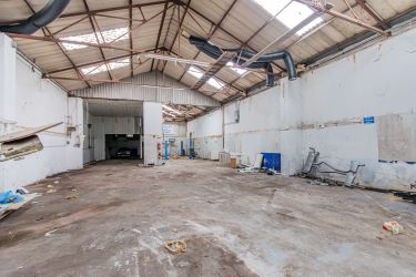 Large industrial unit in this busy area of Cardiff extending to approximately 5,500sqft formerly operated as a car servicing garage. Suitable for a variety of uses, subject to any necessary consents. Please note that the adjacent building is for sale as the previous lot.