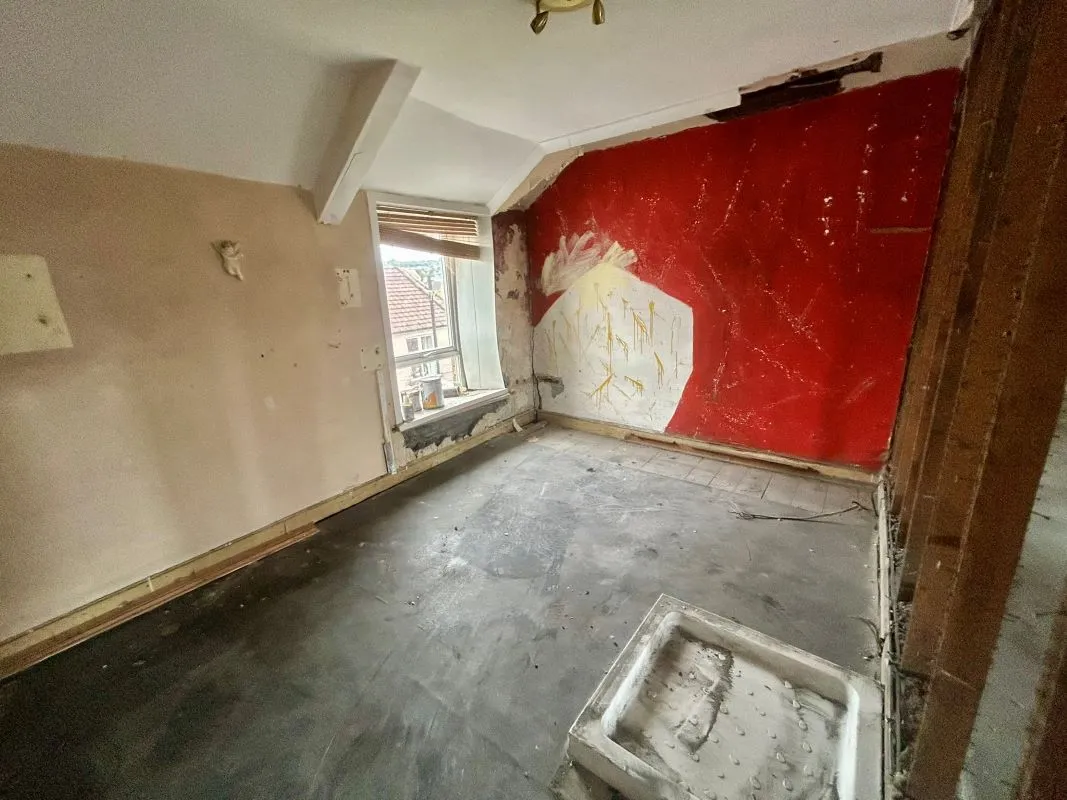 Opportunity to acquire this three storey end of terrace property in Neath. Three retail units to the ground floor with residential redevelopment opportunity to upper floors and a large rear car park.