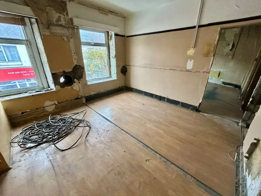 Opportunity to acquire this three storey end of terrace property in Neath. Three retail units to the ground floor with residential redevelopment opportunity to upper floors and a large rear car park.