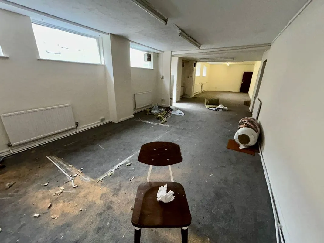 Opportunity to acquire this three storey end of terrace property in Neath. Three retail units to the ground floor with residential redevelopment opportunity to upper floors and a large rear car park.