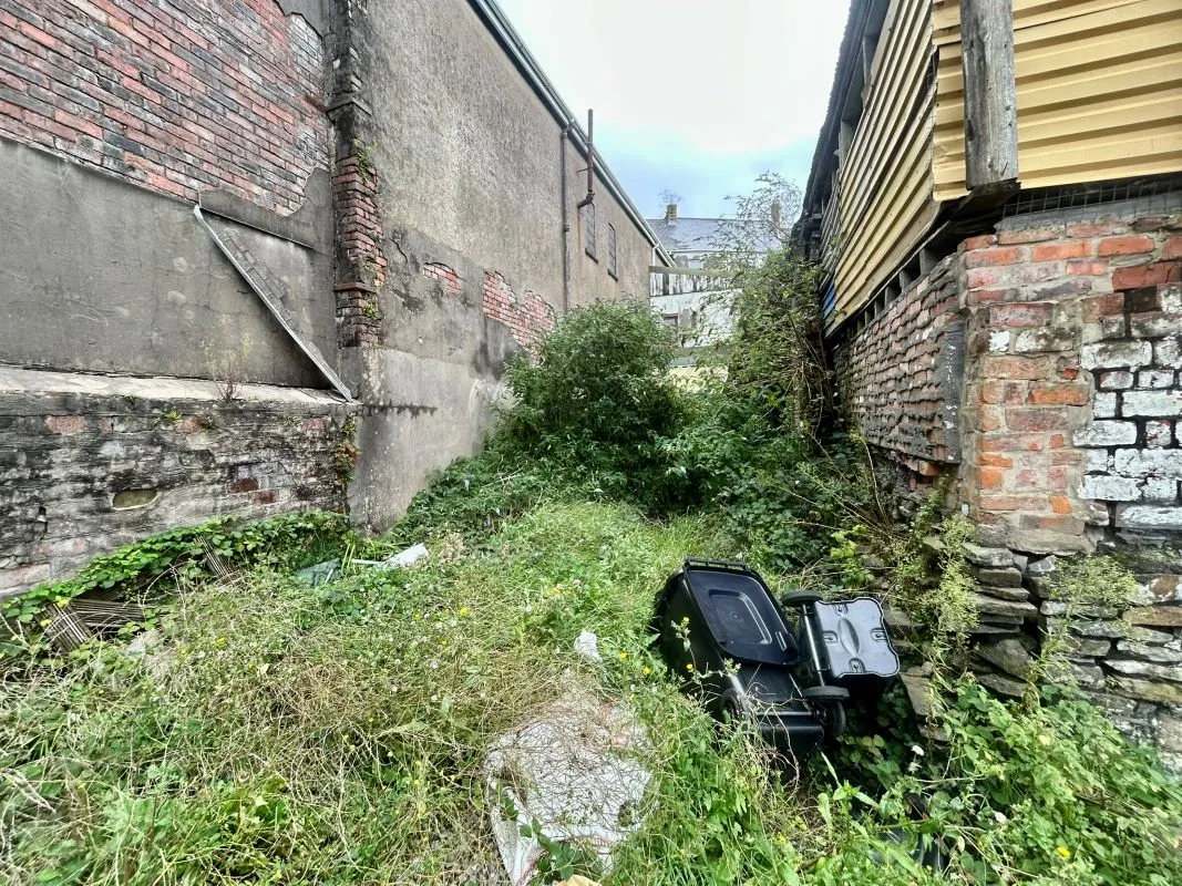 Opportunity to acquire this three storey end of terrace property in Neath. Three retail units to the ground floor with residential redevelopment opportunity to upper floors and a large rear car park.