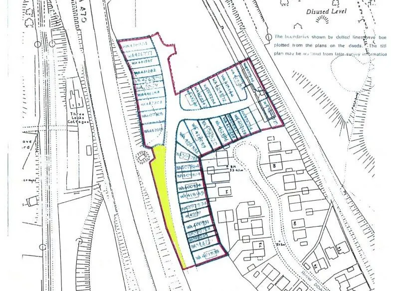 Nil Reserve - Strip of overgrown woodland ancillary land in Taffs Well close to the A470 facing Glan-y-Ffordd, Taffs Well.