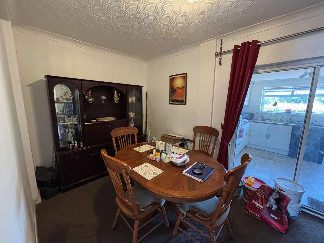 A traditional three-bedroom semi-detached house situated in the established residential area of Garden Suburbs in Trimsaran, offering scope for modernisation and improvement.