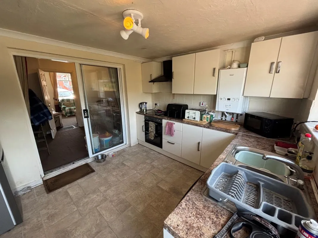 A traditional three-bedroom semi-detached house situated in the established residential area of Garden Suburbs in Trimsaran, offering scope for modernisation and improvement.