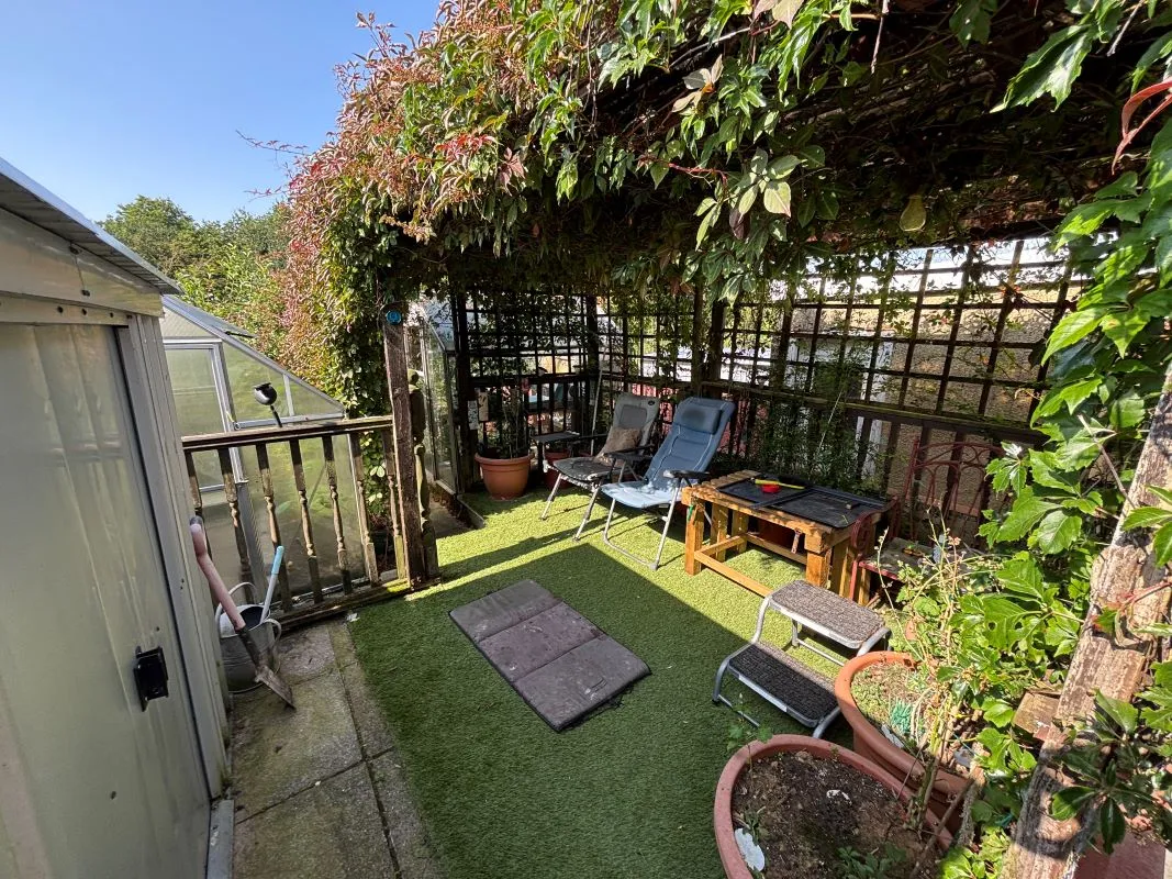 A traditional three-bedroom semi-detached house situated in the established residential area of Garden Suburbs in Trimsaran, offering scope for modernisation and improvement.