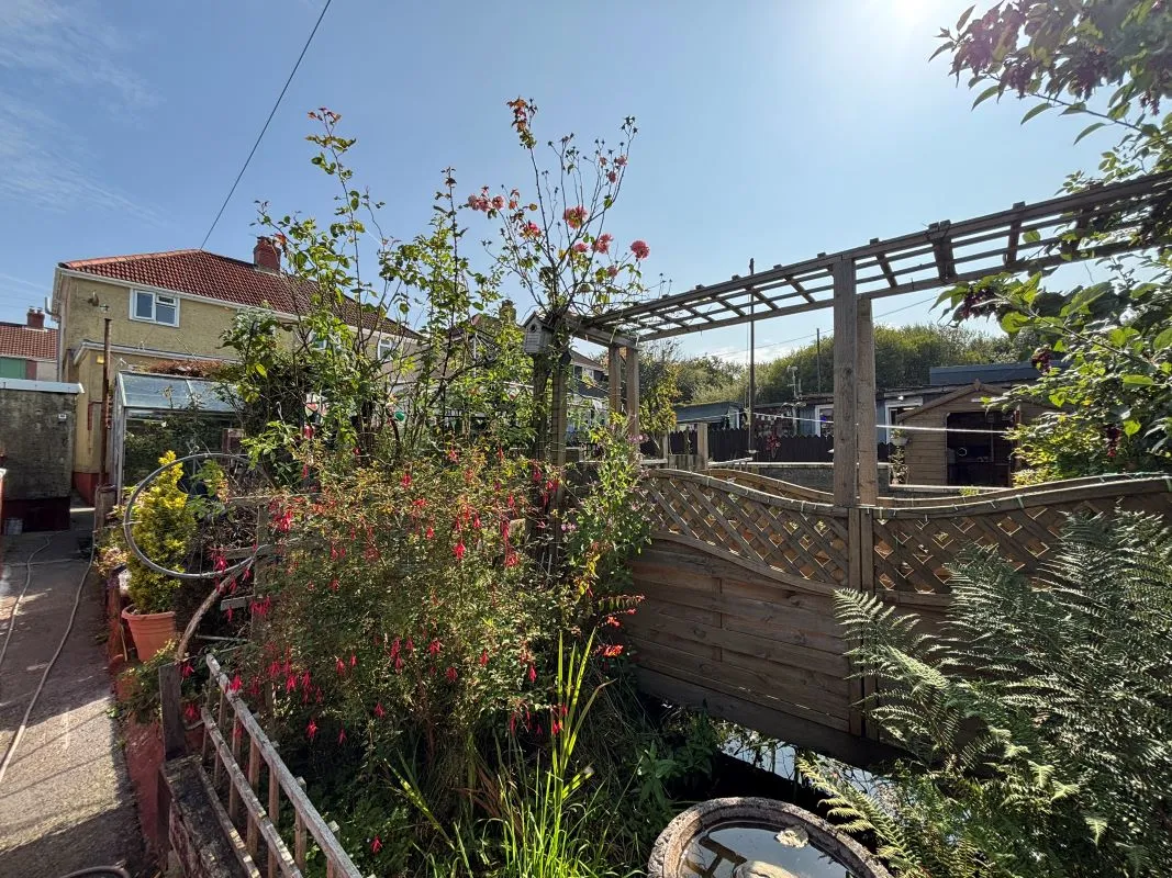 A traditional three-bedroom semi-detached house situated in the established residential area of Garden Suburbs in Trimsaran, offering scope for modernisation and improvement.