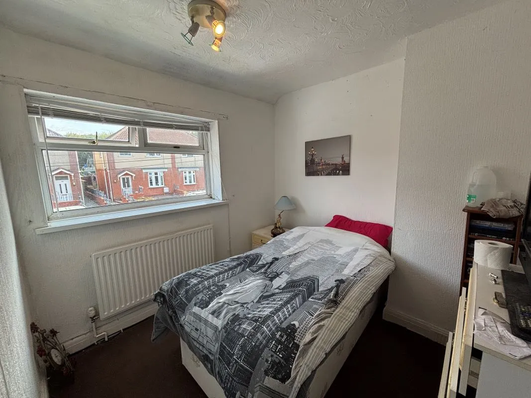A traditional three-bedroom semi-detached house situated in the established residential area of Garden Suburbs in Trimsaran, offering scope for modernisation and improvement.