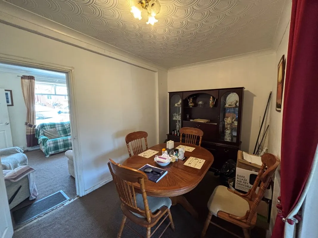 A traditional three-bedroom semi-detached house situated in the established residential area of Garden Suburbs in Trimsaran, offering scope for modernisation and improvement.