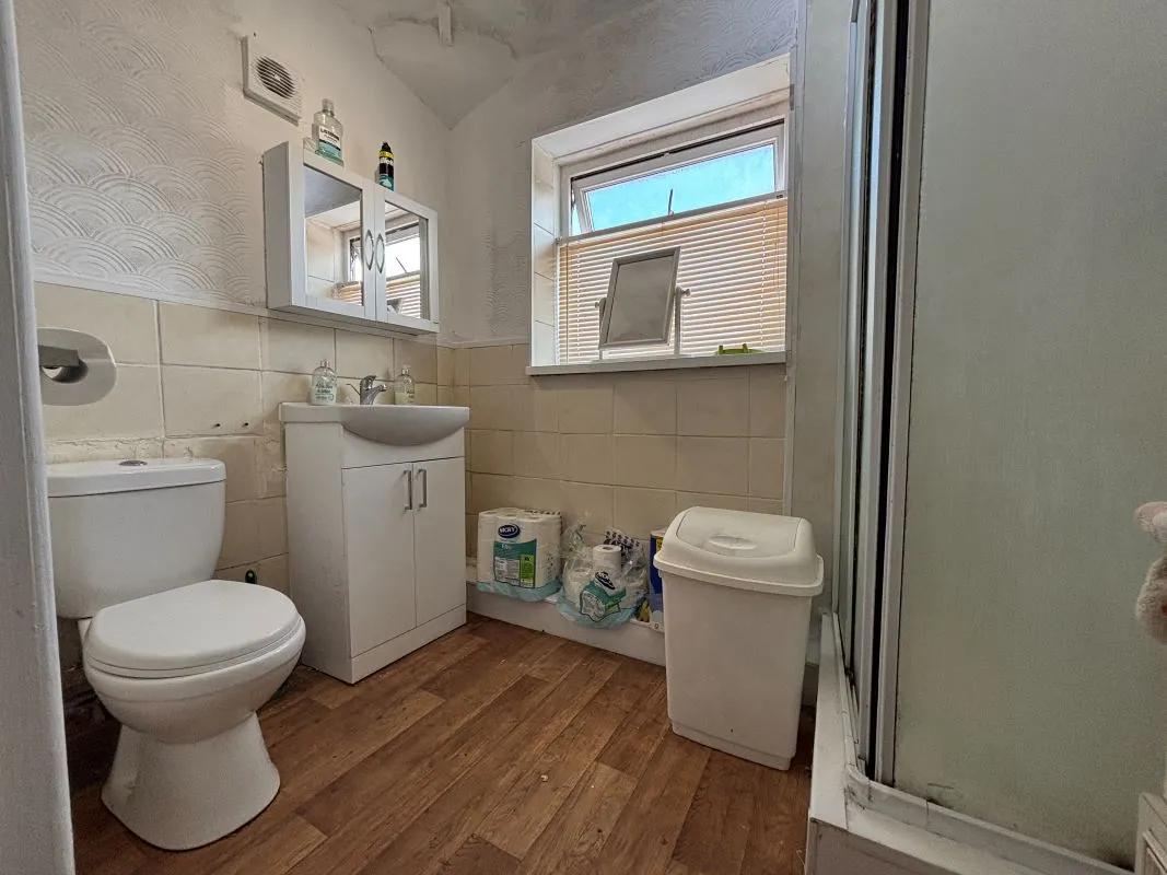 A traditional three-bedroom semi-detached house situated in the established residential area of Garden Suburbs in Trimsaran, offering scope for modernisation and improvement.
