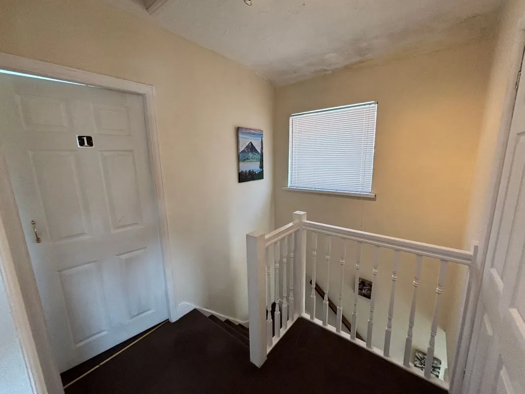 A traditional three-bedroom semi-detached house situated in the established residential area of Garden Suburbs in Trimsaran, offering scope for modernisation and improvement.