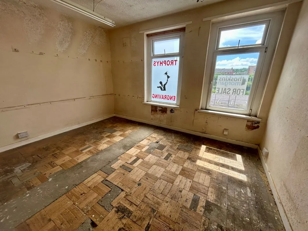 Partly let Investment property of two retail units and one large apartment across the whole first floor, in this popular run of shops at the Victoria park end of Cowbridge Road East.