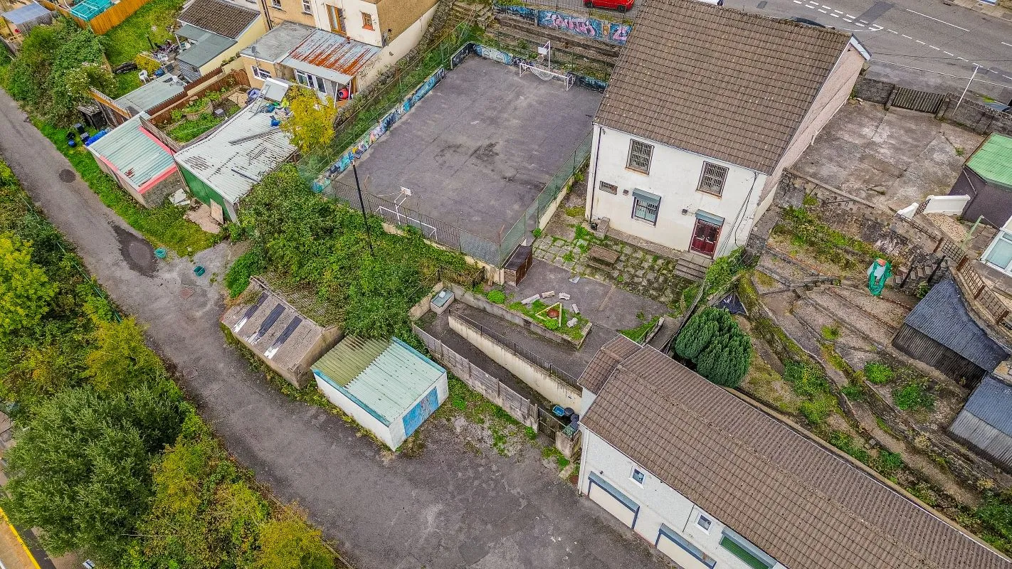 Converted chapel and further large outbuilding currently operated as a 14-16 bed short-term let/hostel with shared rooms and four bathrooms. Potential for development, subject to consents.