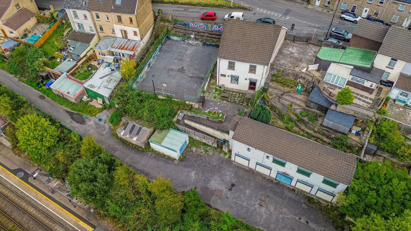 Converted chapel and further large outbuilding currently operated as a 14-16 bed short-term let/hostel with shared rooms and four bathrooms. Potential for development, subject to consents.