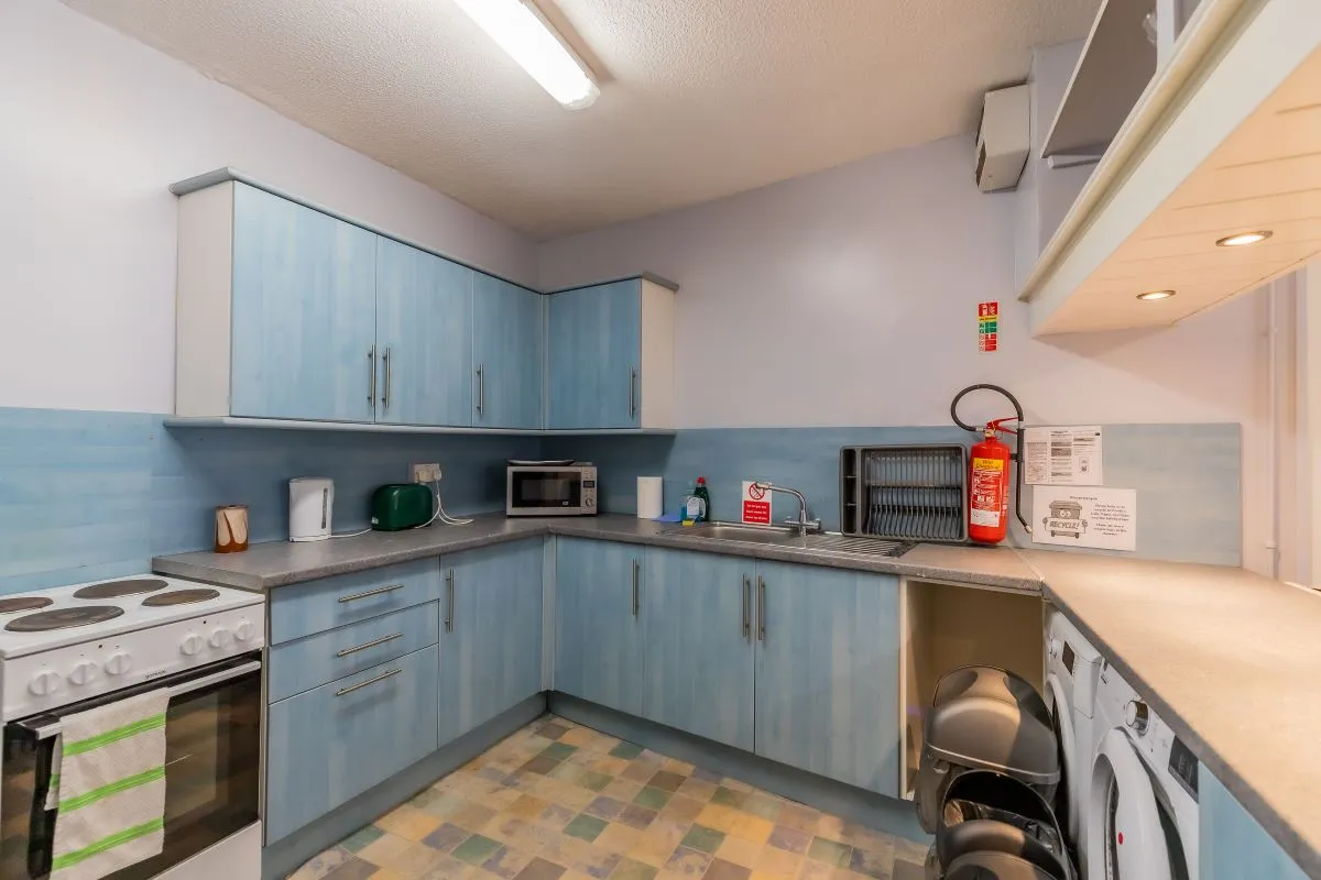 Converted chapel and further large outbuilding currently operated as a 14-16 bed short-term let/hostel with shared rooms and four bathrooms. Potential for development, subject to consents.