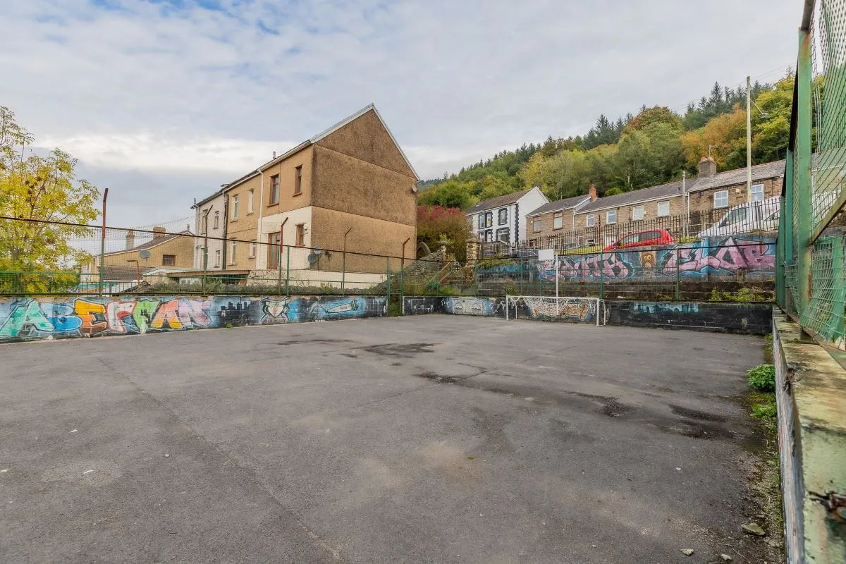 Converted chapel and further large outbuilding currently operated as a 14-16 bed short-term let/hostel with shared rooms and four bathrooms. Potential for development, subject to consents.