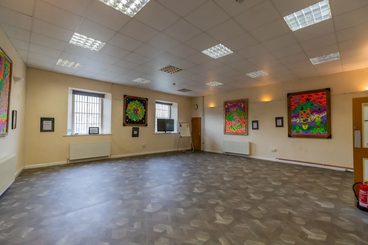 Converted chapel and further large outbuilding currently operated as a 14-16 bed short-term let/hostel with shared rooms and four bathrooms. Potential for development, subject to consents.