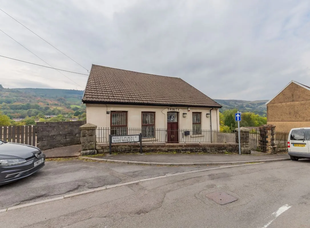 Converted chapel and further large outbuilding currently operated as a 14-16 bed short-term let/hostel with shared rooms and four bathrooms. Potential for development, subject to consents.