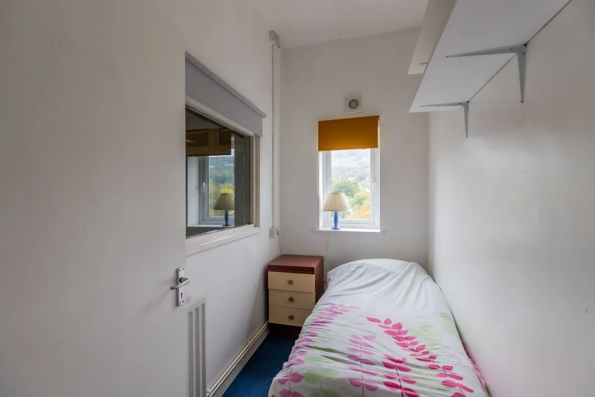 Converted chapel and further large outbuilding currently operated as a 14-16 bed short-term let/hostel with shared rooms and four bathrooms. Potential for development, subject to consents.