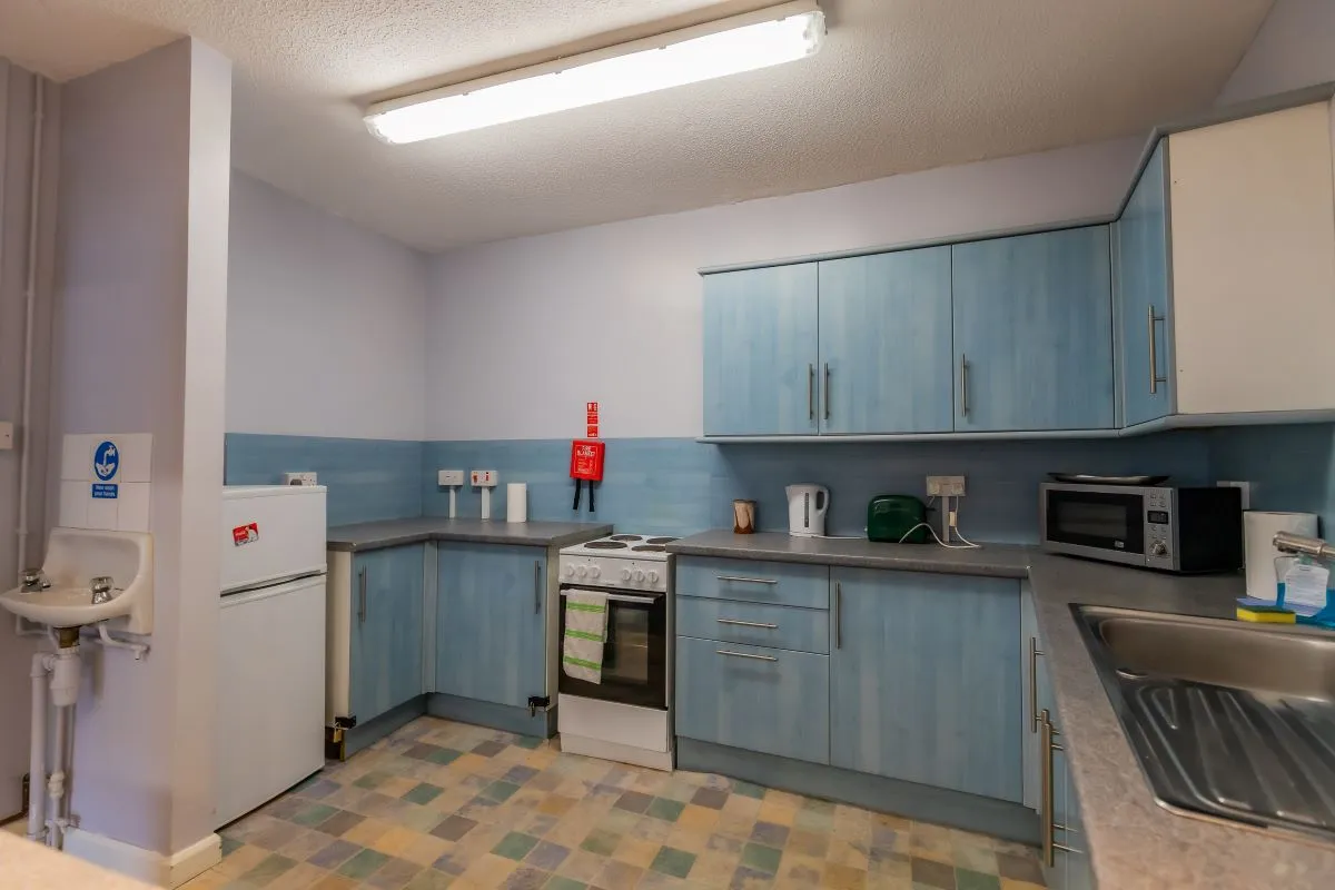 Converted chapel and further large outbuilding currently operated as a 14-16 bed short-term let/hostel with shared rooms and four bathrooms. Potential for development, subject to consents.