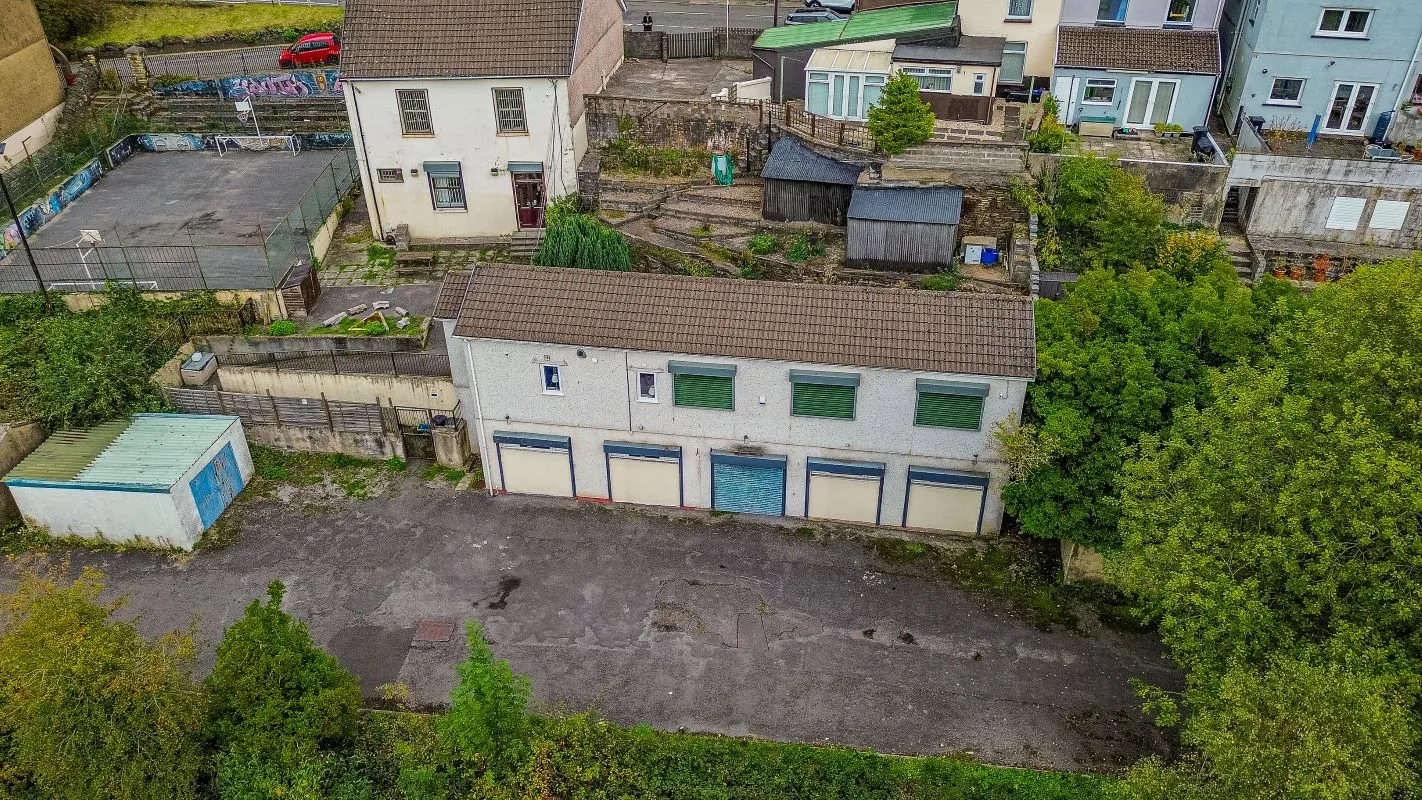 Converted chapel and further large outbuilding currently operated as a 14-16 bed short-term let/hostel with shared rooms and four bathrooms. Potential for development, subject to consents.