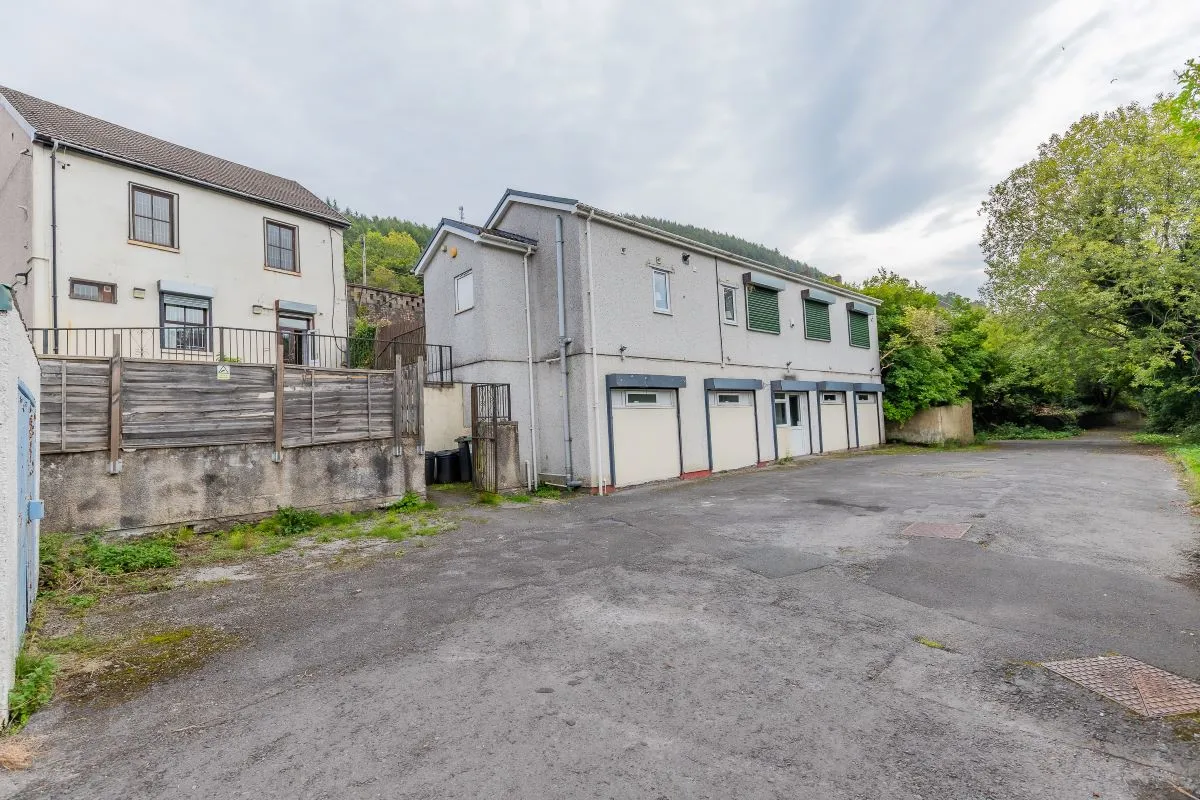 Converted chapel and further large outbuilding currently operated as a 14-16 bed short-term let/hostel with shared rooms and four bathrooms. Potential for development, subject to consents.