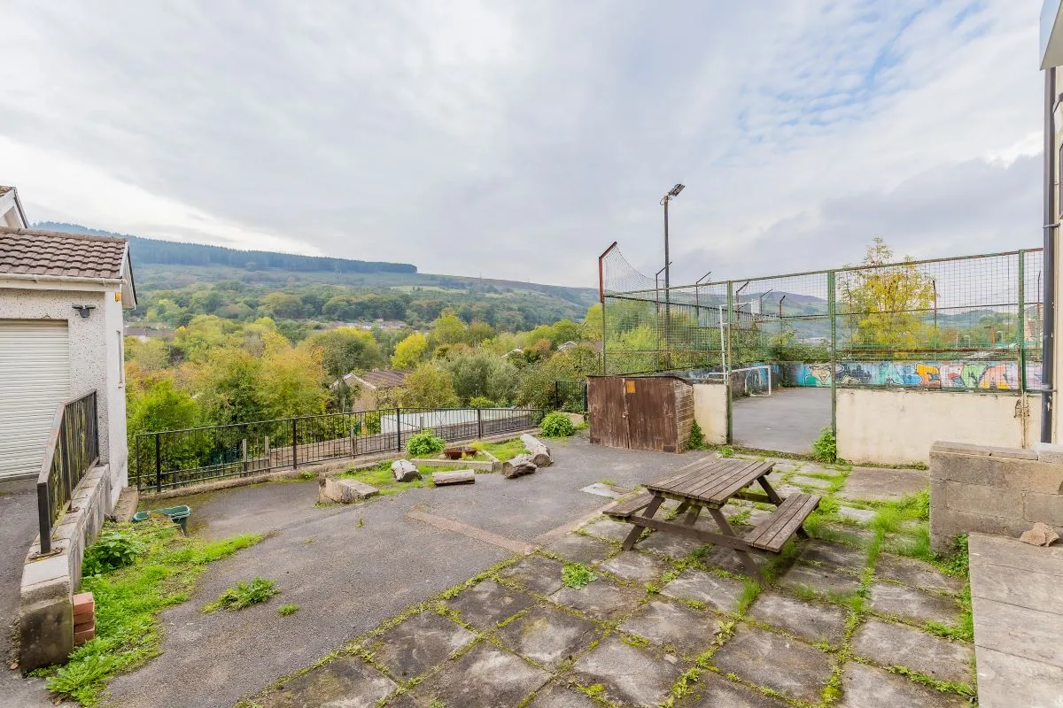 Converted chapel and further large outbuilding currently operated as a 14-16 bed short-term let/hostel with shared rooms and four bathrooms. Potential for development, subject to consents.