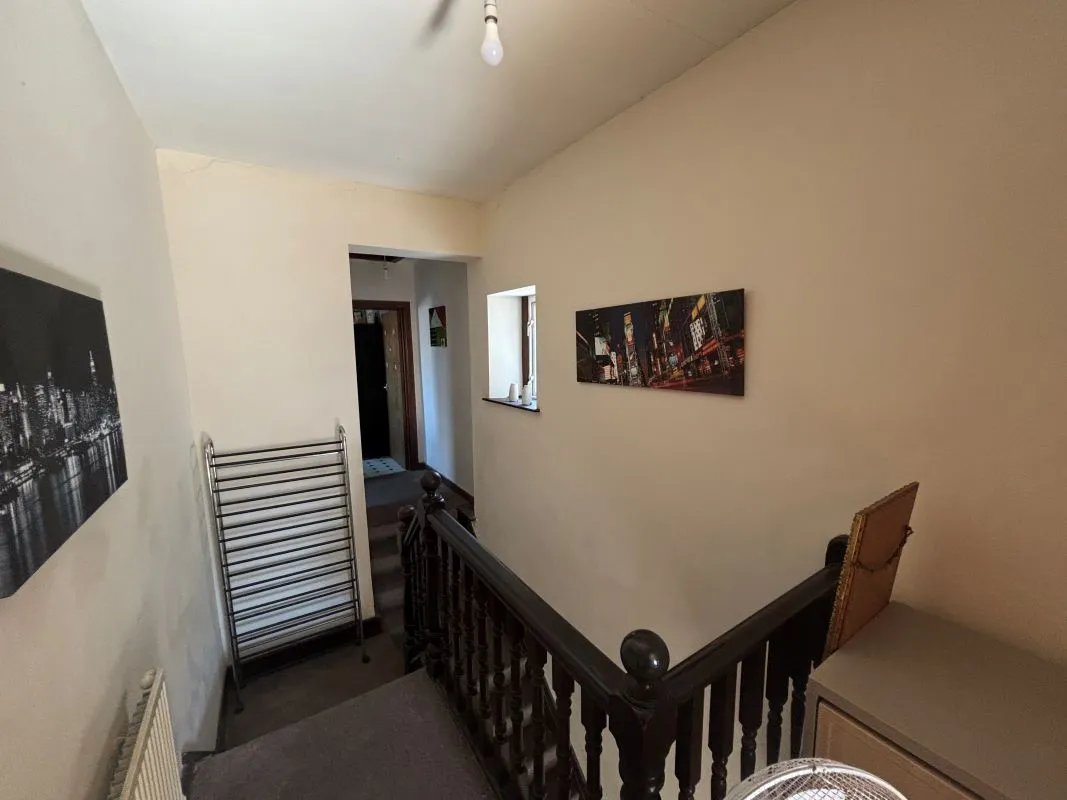 Bay-fronted end of terrace property converted into two apartments in this popular and well regarded area of Llanelli.
