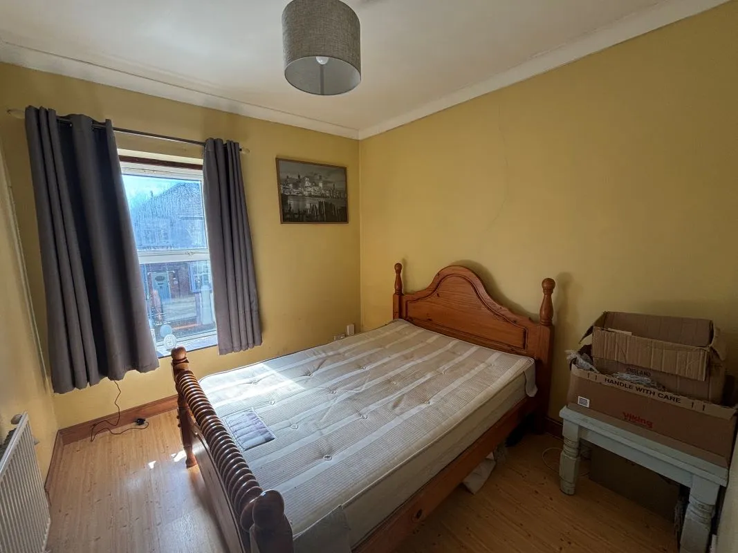 Bay-fronted end of terrace property converted into two apartments in this popular and well regarded area of Llanelli.