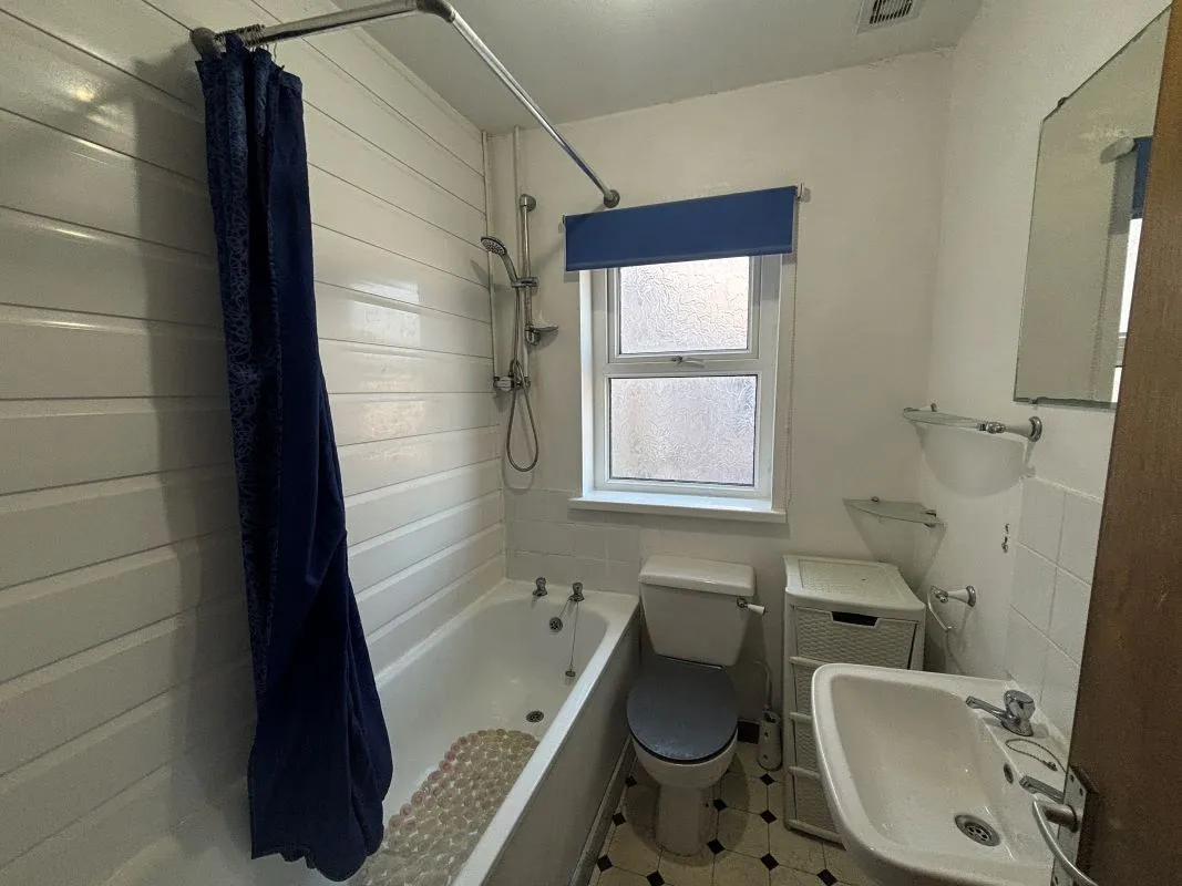 Bay-fronted end of terrace property converted into two apartments in this popular and well regarded area of Llanelli.