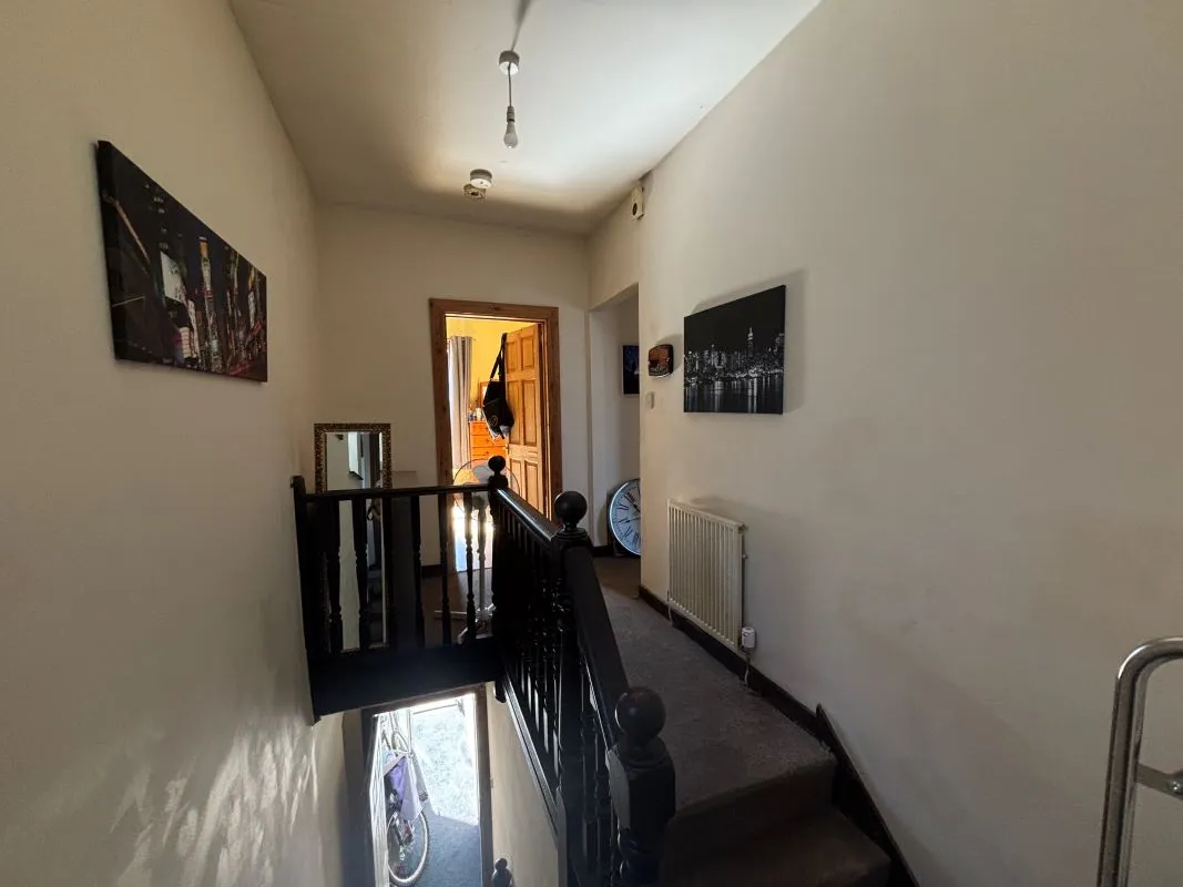 Bay-fronted end of terrace property converted into two apartments in this popular and well regarded area of Llanelli.