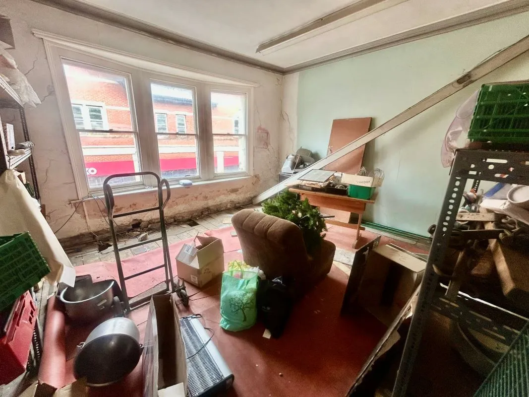 Extensive four storey property in the heart of Barry's retail centre with attractive shop front and huge potential for the upper floors, subject to any necessary consents. Leasehold.