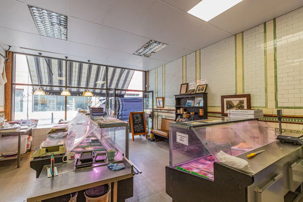 Extensive four storey property in the heart of Barry's retail centre with attractive shop front and huge potential for the upper floors, subject to any necessary consents. Leasehold.