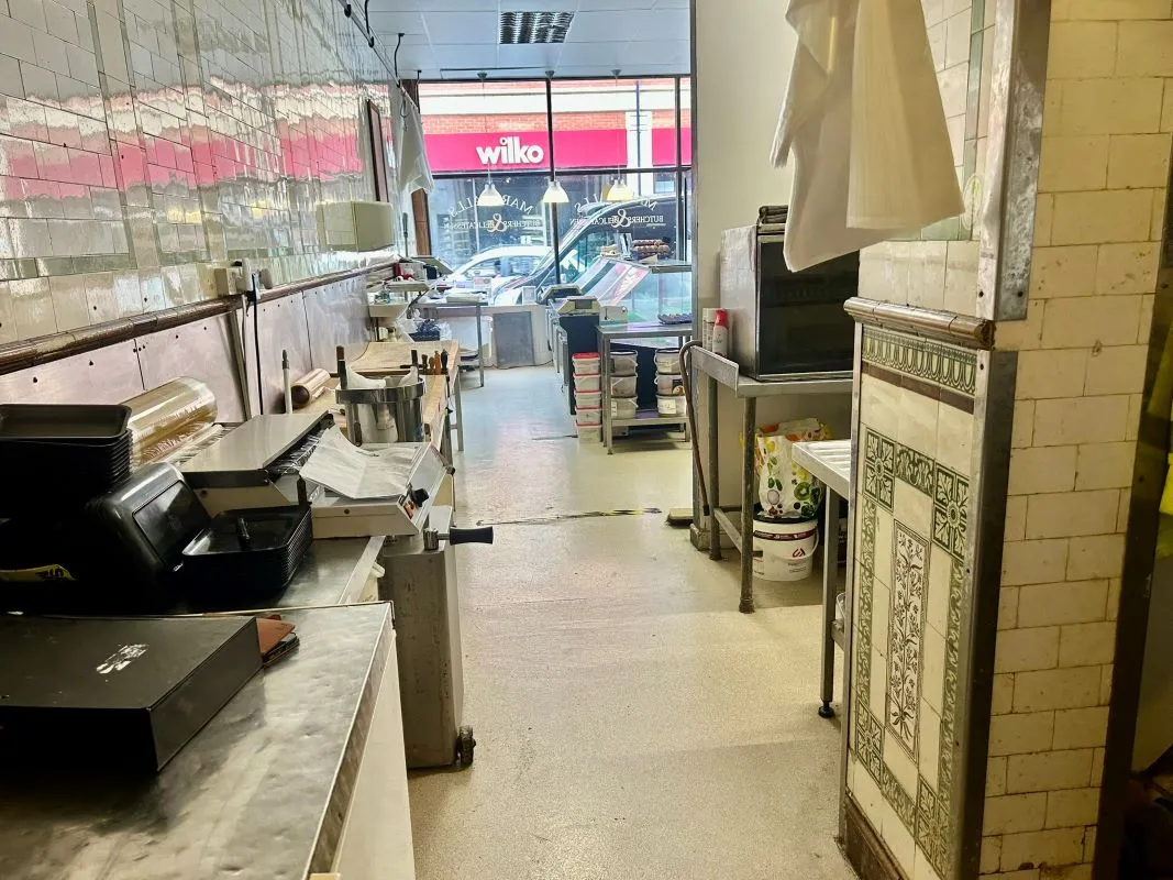 Extensive four storey property in the heart of Barry's retail centre with attractive shop front and huge potential for the upper floors, subject to any necessary consents. Leasehold.