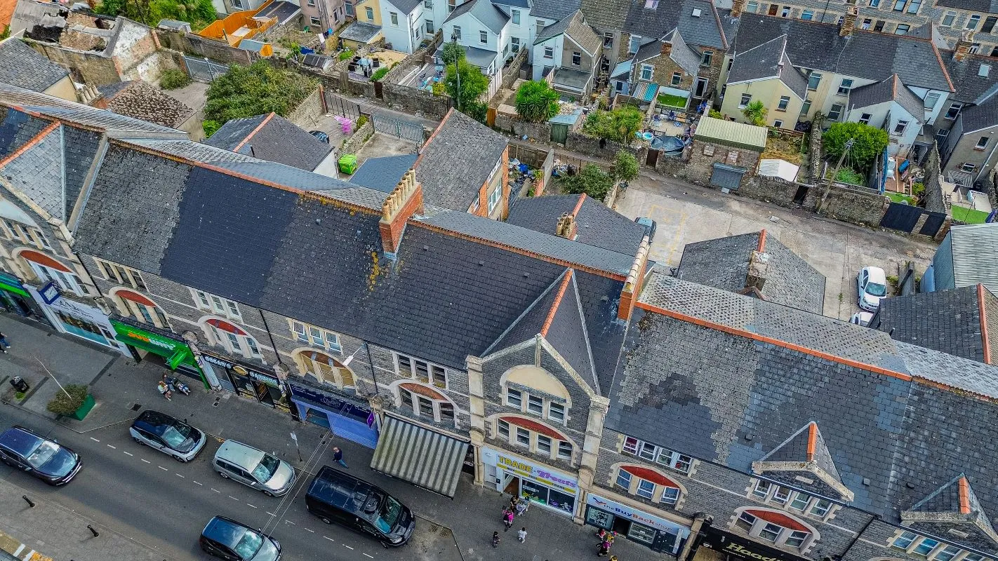 Extensive four storey property in the heart of Barry's retail centre with attractive shop front and huge potential for the upper floors, subject to any necessary consents. Leasehold.