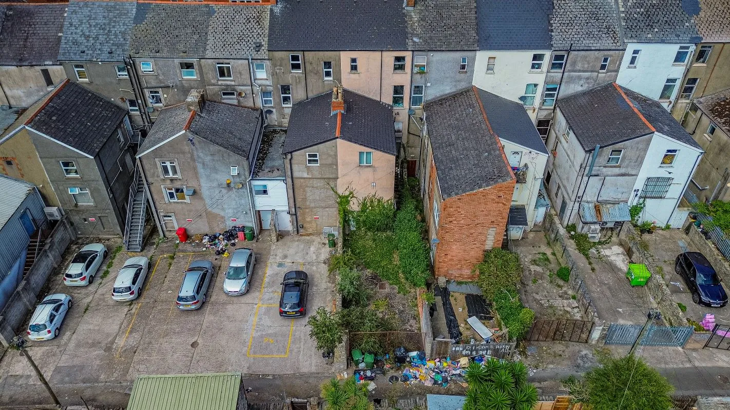 Extensive four storey property in the heart of Barry's retail centre with attractive shop front and huge potential for the upper floors, subject to any necessary consents. Leasehold.
